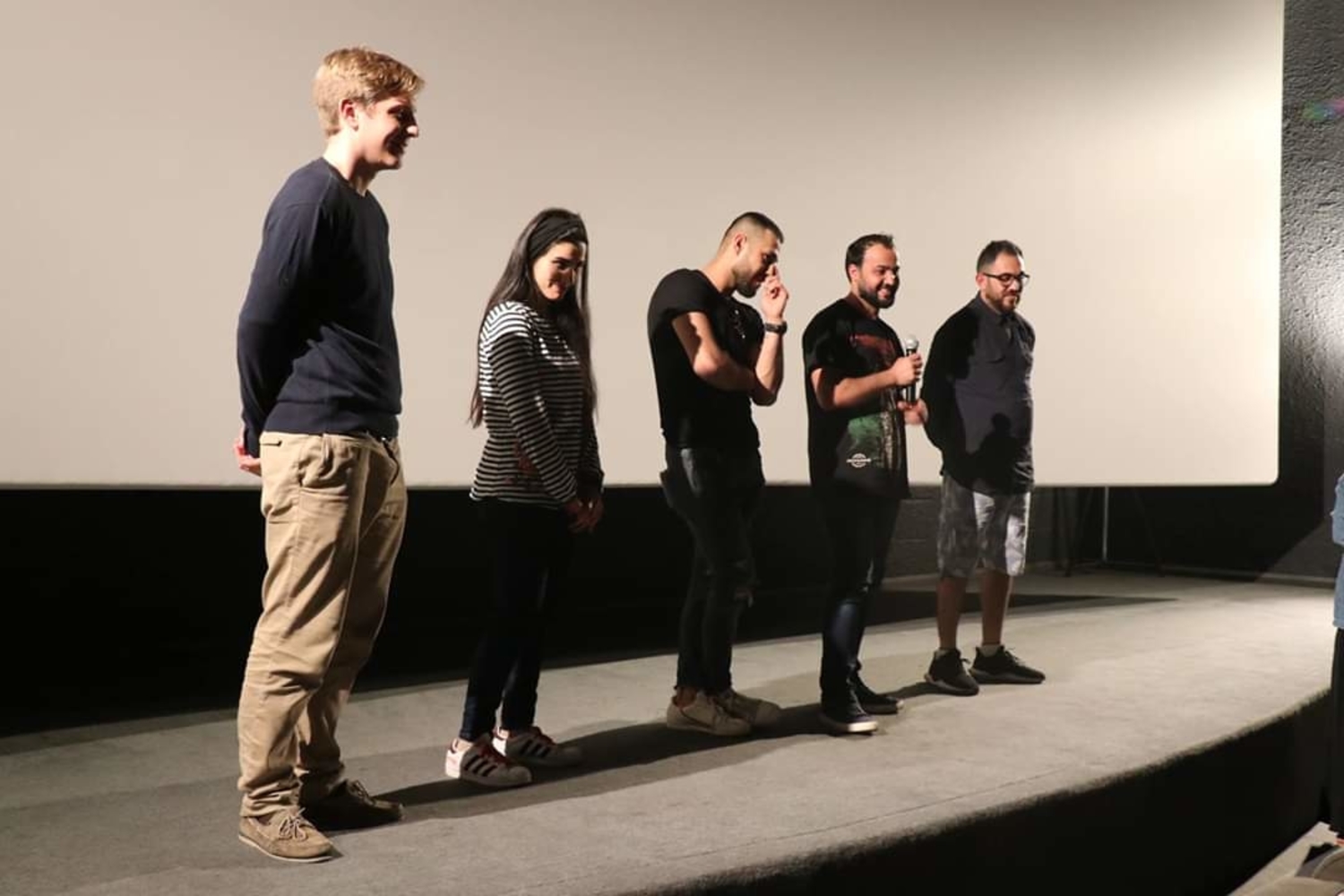 Photo prise lors de la présentation d’un court-métrage en Belgique, présentation à laquelle Majdi a participé / crédit photo : Majdi